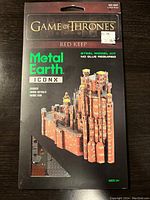 Photo of Metal Earth ICONX Red Keep model kit box showing the detailed castle model image on front.