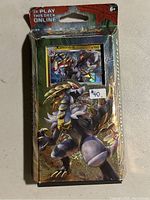 Sealed Sun & Moon Crimson Invasion Pokémon deck in original packaging. The packaging shows Kommo-o artwork and a visible card with Kommo-o stats.