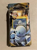 Sealed Pokemon Sword & Shield Darkness Ablaze booster pack featuring Galarian Darmanitan character on packaging and promo card visible.