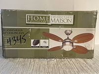 Box showing Home Collection Maison brand and Scandinavian 42-inch ceiling fan description, condition new in box, includes image of the fan.