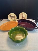 All five pieces displayed front-facing on tablecloth