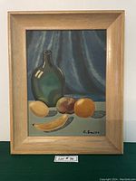 Full front view of framed painting showing overall composition and frame condition