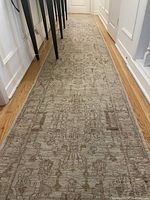 Full-length view of runner in hallway showing overall design and condition