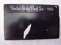 Black outer packaging envelope with 'United States Proof Set 1976' text.