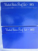 Photo showing blue cardboard packaging for the 1971 and 1972 United States Proof Sets with collectors text.