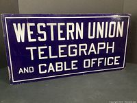 Front view of enamel sign showing full text and color