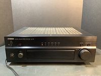 Front view of amplifier powered on with power indicator lit