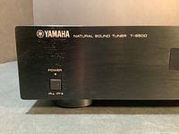 Front left detail showing power button and Yamaha T-S500 branding on black metal chassis.