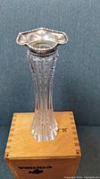 Front view of the etched crystal bud flower vase with silver crowned rim
