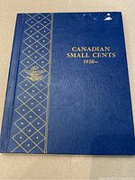Blue cover with gold foil title 'Canadian Small Cents 1920–'