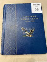 Front cover of binder showing title text and eagle emblem