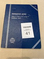 Photo of blue Whitman coin album cover titled 'Canadian Dime Collection 1937 to Date Number Two'