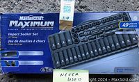 Mastercraft Maximum branded box showing the 49-piece impact socket set with 1/2" drive and images of the socket types included.
