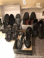 Photo shows an assortment of men's shoes that include rain boots, safety shoes, baseball sneakers, slip-ons, and sandals in size 9.