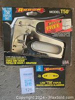 Arrow Model T50 heavy duty staple tool tacker in original packaging with 1,250 T50 staples included.