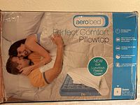 Box showing AeroBed brand and Perfect Comfort Pillowtop model with features details and image of mattress.