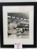 The framed black and white 8x10 photograph shows Mickey Mantle and another Yankees player, with Mantle's autograph in blue ink across the top.