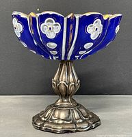 Front view of the antique Bohemian glass bowl with blue and white overlay on silver base showing overall shape and condition