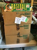 Three stacked cardboard shipping cases labeled '00441 8 Boxes' with note '8 Fleer Boxes in each case'.
