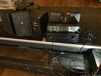 Overview of audio equipment and four speakers arranged on stage