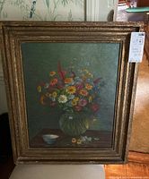 Full front view of the framed painting showing overall composition and frame condition