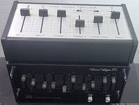 Sound Shaper One EQ and Six Channel Universal Stereo Mixer stacked, showing front controls and sliders.