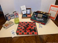 Overview photo showing all included items on a plain background with seller's information and the lot items.