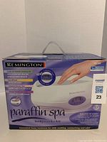 Remington Paraffin Spa box front view showing branding, product name HS 500, and usage details for hands, elbows, knees, and feet.