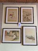 Full set of 4 framed Japanese prints arranged on a wall, showing varied traditional subject matter and black bamboo style frames.