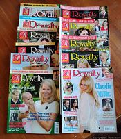 Full view of 12 Royalty magazines from 2004, stacked and arranged to show front covers with images of royals including William and Kate, showcasing condition and variety in the lot.