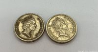 Two British one pound coins obverse side showing Queen Elizabeth II portrait