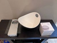 Photo showing all three items together: Soehnle food scale, white decorative bowl, and boxed Google Nest Mini
