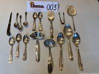 Wide view of all 19 pieces arranged on table