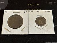 Obverse side showing front of 1881 Canadian Large 1 Cent and 1881 US Indian Head penny