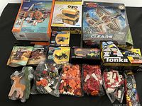 Full lot overview showing boxed kits, construction sets, blind bags, and loose building blocks.