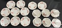 Full set of 10 dessert plates, 6 cups and 6 saucers laid out flat to show quantity and pattern