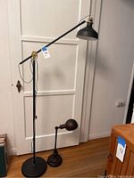 Overall view of the lot including the floor lamp and desk lamp together, showing the height difference and details.