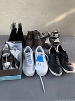 Overview of the six pairs of shoes showing various styles and colors