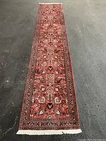 Full-length top-down view of runner on floor