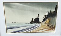 Close-up view of watercolor painting depicting coastal scene with rock formation and waves