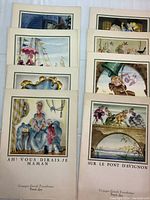 Photo showing eight colorful French Line menus arranged in two columns with detailed retro illustrations on covers.