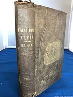 Front spine and boards showing gilt title 'Uncle Tom's Cabin H.B. Stowe Vol. I' and overall wear