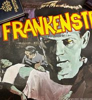 Close-up of lithograph poster showing Frankenstein monster and movie scene with 'FRANKENSTEIN' title.