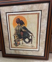 Framed print showing full artwork and frame condition.