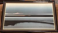 Full view of framed Tetsuro Sawada serigraph wall art showing abstract horizon and horizontal rectilinear bands in blues and black.