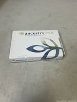 Front view of one sealed Ancestry DNA Activation Kit box showing branding and packaging.