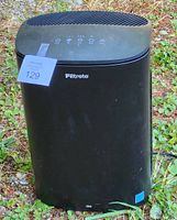 Front view of black Filtrete 3M air filter unit with visible control panel and brand logo.