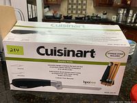 Box of Cuisinart electric knife showing brand and model along with storage stand image on the packaging.