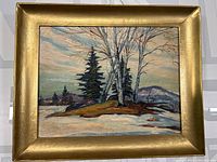 Framed painting showing winter landscape with birch and pine trees, artist signature visible.