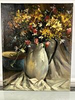 Full view of the floral still life painting showing the white pitcher with flowers and draped fabric background.